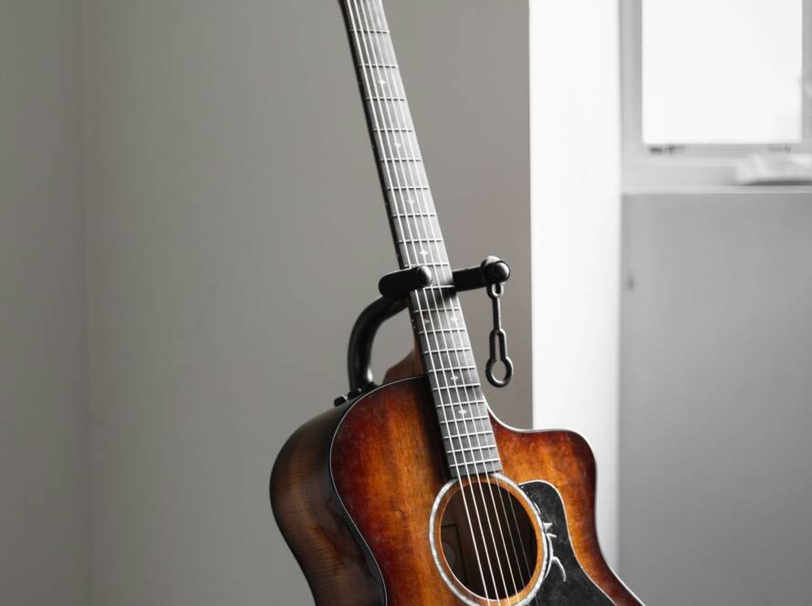 Acoustic guitar representing songwriting and musical storytelling
